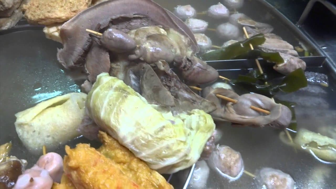 Night Market: Scooters. Ads. And food.